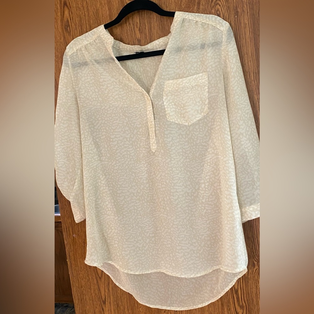 Maurices semi-sheer abstract lightweight  top. V neck Size medium